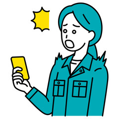 スマートフォンの画面を見て驚く作業員の女性