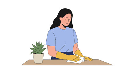 Young woman cleaning table with cloth while wearing yellow gloves  