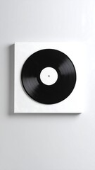 Obraz premium Black vinyl record on white backdrop