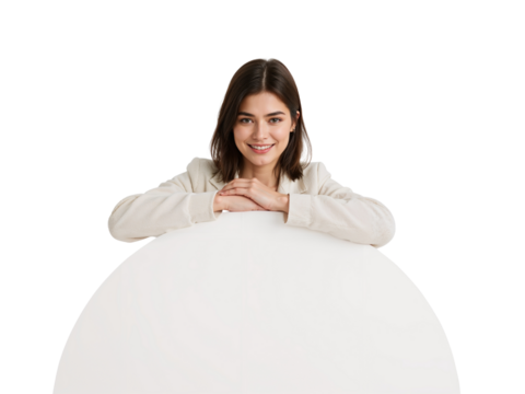 Elegant brunette woman in a white suit leans on a blank white surface, smiling softly on a clean - Powered by Adobe