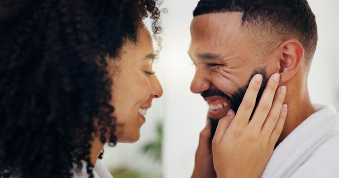 Bathroom, love and touching face with couple in home together for bonding or morning routine. Beard, satisfaction and skincare with smile of people in apartment for beauty, grooming or hygiene - Powered by Adobe