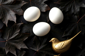 Minimalistic Close-Up of White Eggs and Gold Bird Sculpture on Fall Leaves