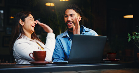 Happy, coffee shop and business people high five on laptop for success, good news and approval....