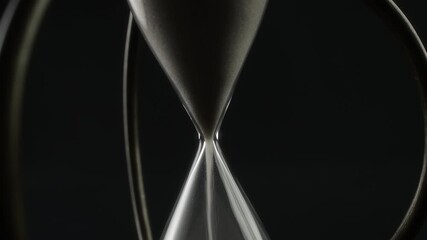 Abstract shot of vintage hourglass with white sand rotating - Powered by Adobe