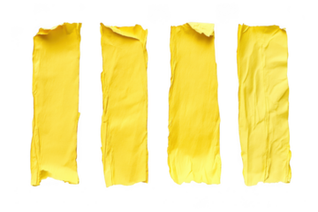 Four vertical torn yellow paper strips with rough edges isolated on transparent background