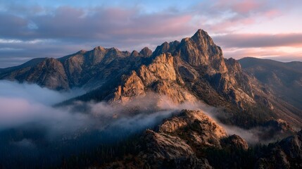 Fototapeta premium Mountain ridge above clouds at golden sunrise – generative AI