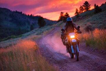 Dual Sport Motorcycle Enduro Rider on the Continental Divide Ride at Dusk