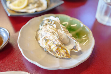 grilled Oyster in Matsushima fish market, seafood famous and popular of Matsushima bay in Miyagi...