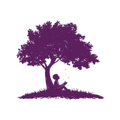 Boy with Book Sitting Beneath Big Tree