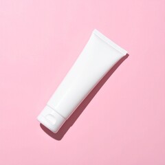 White Cosmetic Squeeze Tube Mockup Lying on Pastel Pink Background Minimal Clean Skincare Product Presentation
