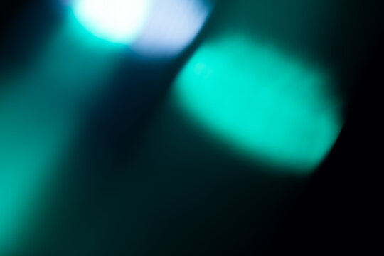 light leak overlay effect with blur blue light leaks,retro noisy film texture light leak flare on black background,abstract colorful background