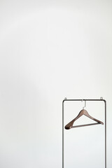 Single Wooden Hanger on a Minimalist Rack