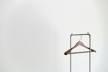 Single Wooden Hanger on a Minimalist Rack