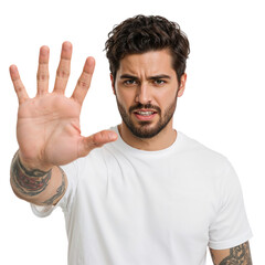 Naklejka premium Serious young man showing a stop hand gesture with a stern expression on an isolated transparent background.