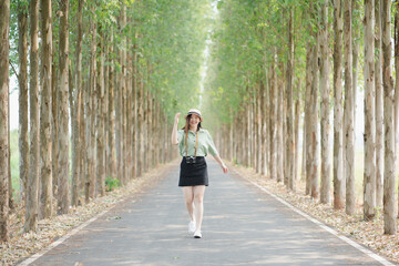 asian woman happy with travel and relax at outdoor on spring season