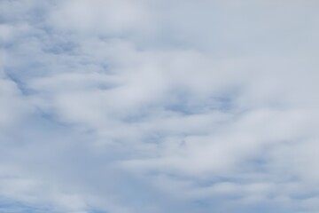 Fiery sunset clouds painting the sky with vibrant orange and gold