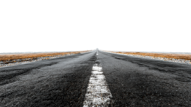 Expansive view of a stretch of road disappearing into the horizon on a clear day.