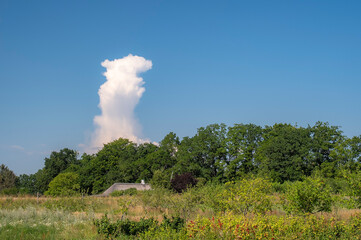 Cloud rises like a pillar in a blue sky - Denmark 2025