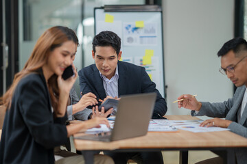 Group of business people are having a meeting at the office.
