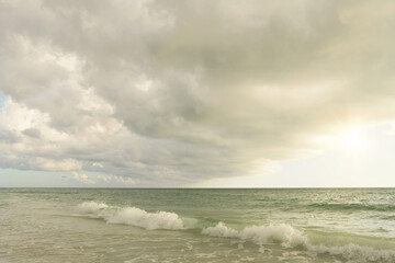 Waves in Gulf of Mexico cloudy sky Anna Maria Island