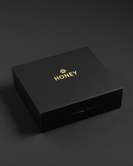 Elegant Black Box with Gold Embossed Honey Label on Dark Background