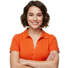 A cheerful young woman with short brown hair wearing an orange polo shirt smiling with arms crossed isolated on transparent background