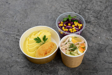 lunch soup with meat, mashed potatoes with a cutlet and salad