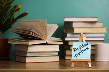 Open book and digital detox sign suggesting a break from technology