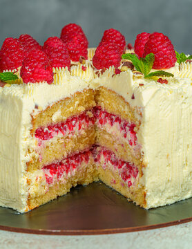 White Chocolate Cake with Fresh Raspberries and Cream 