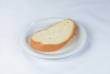 a piece of loaf on a white plate