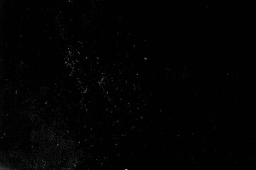 Minimal Black Speckle. Sparse dust specks on clean black background.