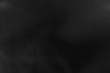 Vintage Dust Texture. Clean abstract texture with minimal white scratches on dark background. 