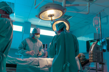 Medical Team Performing Surgical Operation in Operating Room