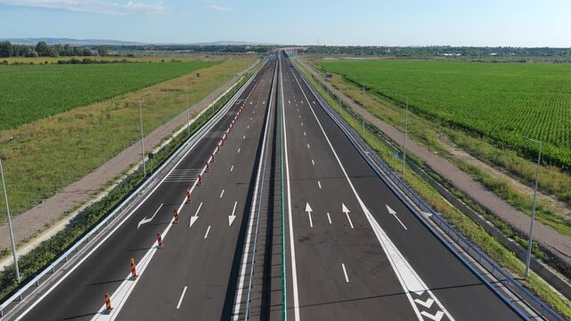 A7 Romania highway 4k aerial video. New bridge over Buzau river on A7 Moldova highway from Bucharest to Suceava. Roads of Romania. A7 high speed road. Transportation industry.