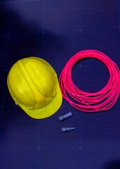Solar Installation Tools and Safety Equipment on Solar Panel Surface