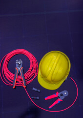 Solar Installation Tools and Safety Equipment on Solar Panel Surface