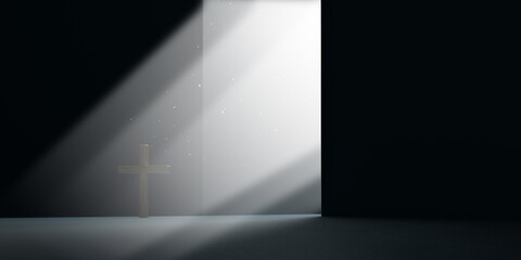 Wooden Christian cross standing under dramatic ray of light from an opening. Concept of faith, hope, divine guidance, salvation, and the path to God.