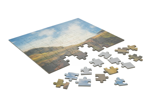 A partially completed jigsaw puzzle depicting a scenic landscape