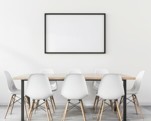 A white dining room table with six white chairs against a white wall with a large black picture frame hanging above