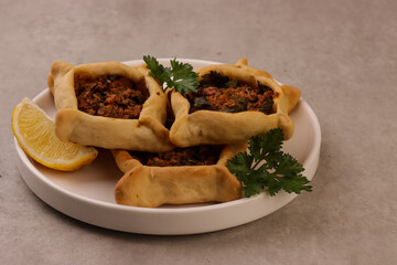 Sfeeha is Lebanese Meat Pies or Middle Eastern Meat Pies. 