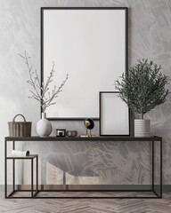A black console table with two empty frames. a vase of branches. a potted plant. a basket. and decorative objects against a textured grey wall