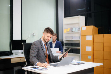 confident businessman works on analytics, financial reports, and strategy. Success, accounting, and teamwork