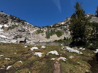 View from Paintbrush canyon looking over alpine lake Holly Lake, Grand Teton National Park