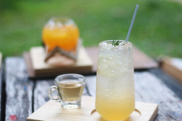 A refreshing iced orange drink garnished