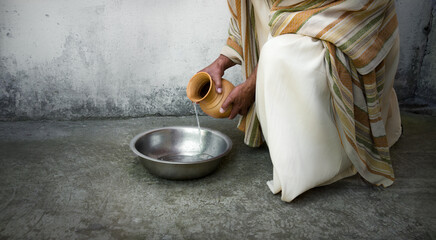 Man pour water into bowl