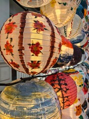 Close-Up of Artistically Painted Floral Lanterns