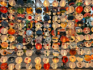 Fototapeta premium Wall of Intricately Decorated Illuminated Lanterns