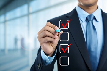 Businessman checking off tasks on a list suit shirt