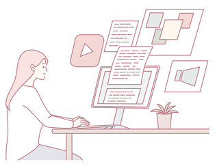 A woman is actively engaging with multiple screens in a modern and contemporary digital workspace setting