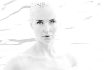 High-Contrast Water Portrait of Blonde Woman